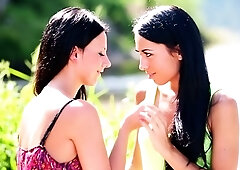 Pale blonde and tanned brunette lesbians toying and licking