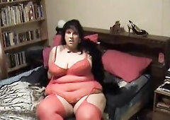 big beautiful woman in Red Nylons and underware posing on camera teasing the viewer