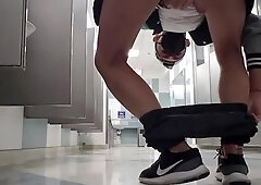 Milking off and spunking with my trousers down to my ankles at the Chicago airport shower