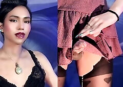 With my flirty petticoat and nylons on, my hard, thick knob pokes out, begging for attention; I pull it all the way out and wank it lazily, feeling it