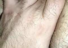 Crossdressing corpulent man fingering rectal hole