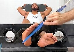 Body tickling session with a bearded muscular guy and foot fetish fun