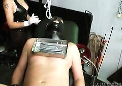 The pathetic loser gets his weenie screwed from inside with metal sticks, during the time that that guy groans and moans like a Sissy at the 1st screw