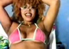 Dorothy Black and Britney use the toy