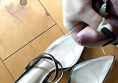 Two streams of jizz on hot high heels