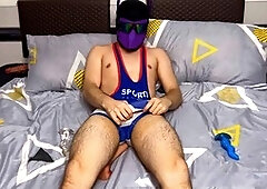 Adorable twink in an athletic gimp outfit having some solo fun