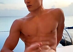 The handsome guy masturbating at the pool