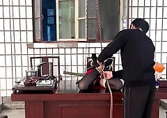 Oriental slave in stockings gets tied up and suspended