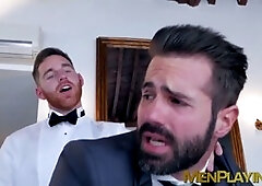 Fashionable hunks pleasure each other at a luxurious hotel