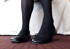 Standing in hot little ebony ballet flats, dipping and heel popping in 'em. Some sitting dip sliding in. Ebony stocking overspread toes.