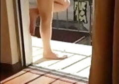 Masturbating naked in his balcony
