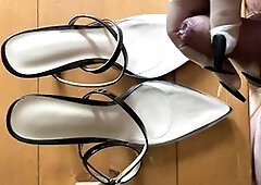 Two streams of jizz on hot high heels