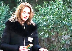 See a really gorgeous woman taking her time with a cigarette outdoors. Taking a stroll, that babe decided to have a fun a pair of minutes by making le
