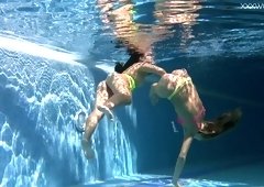 Alla Zlatavlaska and her girlfriend strip and swim under the water