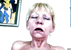 Slutty blond granny, Anna is sucking a goth hard penis and getting it inside her curly twat