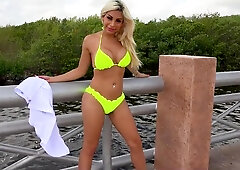 Sexy Blonde Transbabe strutting her stuff in a Bikini and Heels