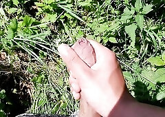 I went out to jerk off in a field by the road.Pretty cum with a worthy cock