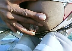 Dark-hued cutie Ass Monkey enjoys some warm solo fun