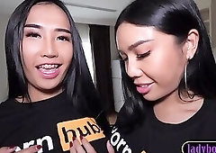 Two teen ladyboys Mos and Meme share a cock in a hot threesome