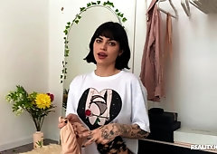 Short-haired chick Freja Noir plays with her rubber sex toy