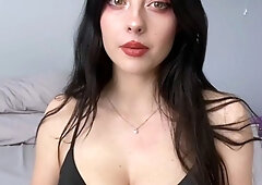 Julia Burch Is Playing With Her Big Tits On The Bed
