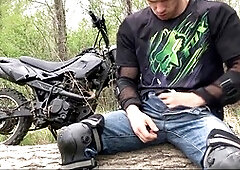 hunky biker jerks off