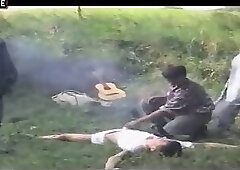 Outdoor three farmers friend and tied boy