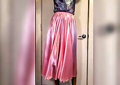 lengthy pink liquid satin petticoat with multiple satin slides with glossy shiny hose. Satin layers.