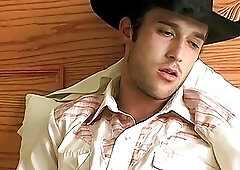 Gay cowboy smokes before stripping nude and stroking his boner