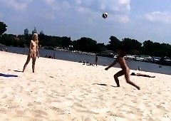 Blonde and redhead cuties reveal their bodies on the beach