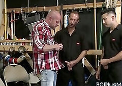 Muscled hunk gets spermed in threesome