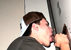 sucking a big black cock glory hole