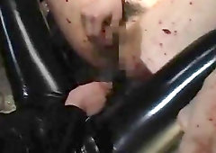 Impressive Asian gets covered with blood while getting pussy probed