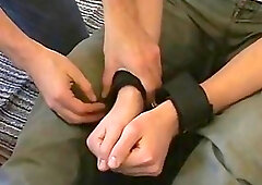 Restrained gay with a foot fetish enjoys being tickled erotically