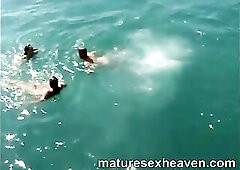 Granny is getting her old cunt taken care of by the boys on a yacht who love to party