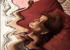 A sultry brunette hair mother I'd like to fuck lounges seductively on the couch in ebony lace underware and sheer nylons, her body aching for int