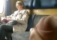 Jerking my dick next to a mature lady