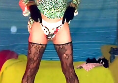 Fresh green sundress and purple hat taunting and bum wiggling