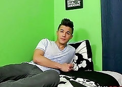 Attractive twink tugs on his cock through underwear and teases