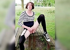 Fascinating outdoor urinate wearing nylons and converse sneakers. Walking and exposing caught in public