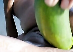 Ebony Angel Masturbates with Cucumber