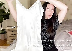 model trying on satin nighties