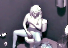 Blonde hottie masturbates in public toilet & gets naughty with a voyeur