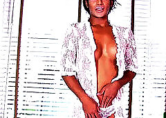 greased she-male stripteases before wanking