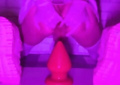 Sissy Cutie In Short Petticoat Bounces On a Massive 12-centimeter Thick Anal Plug