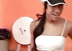 Skinny Latina ladyboy is banged and facialized in the open