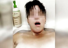 Gal masturbates in bathtub with her fingers and brings herself to climax