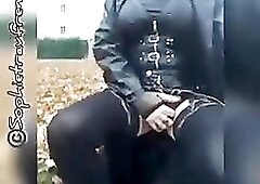 redhead sissy walks outside in ebony vinyl fetish outfit