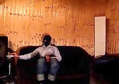 Transsexual In Mask Beating Off Bondaged Dick