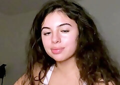 Amateur young brunette enjoys dildo on solo masturbation